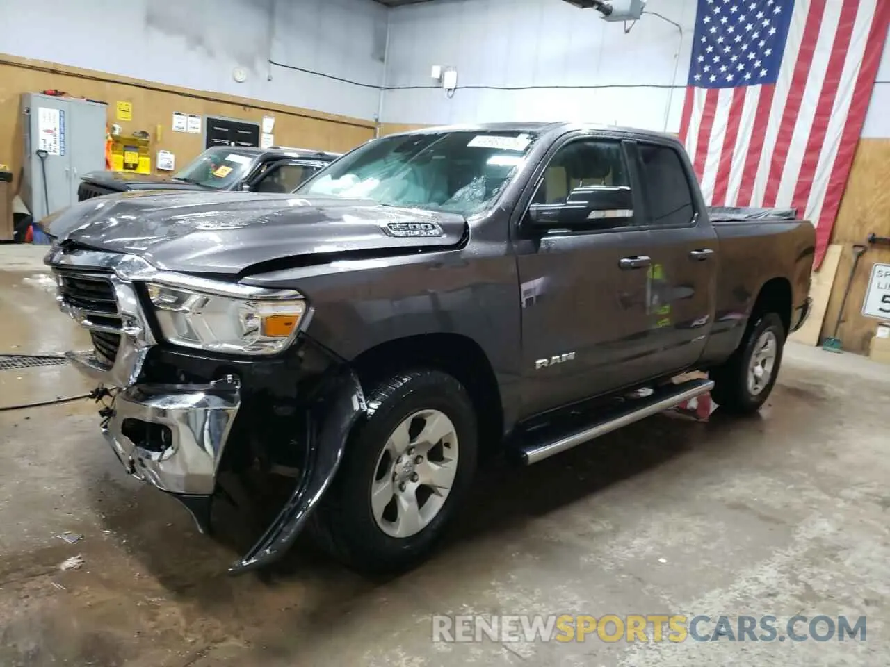 1 Photograph of a damaged car 1C6SRFBT4MN696449 RAM 1500 2021