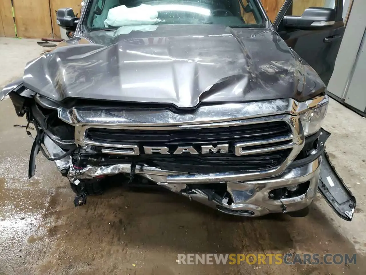 13 Photograph of a damaged car 1C6SRFBT4MN696449 RAM 1500 2021