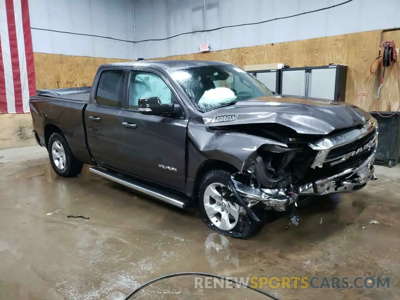 4 Photograph of a damaged car 1C6SRFBT4MN696449 RAM 1500 2021