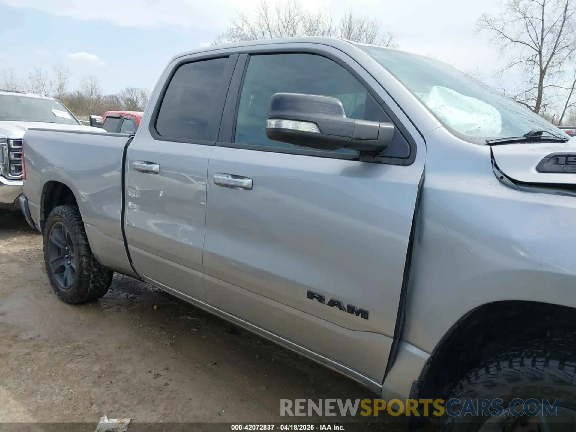 13 Photograph of a damaged car 1C6SRFBT4MN780402 RAM 1500 2021