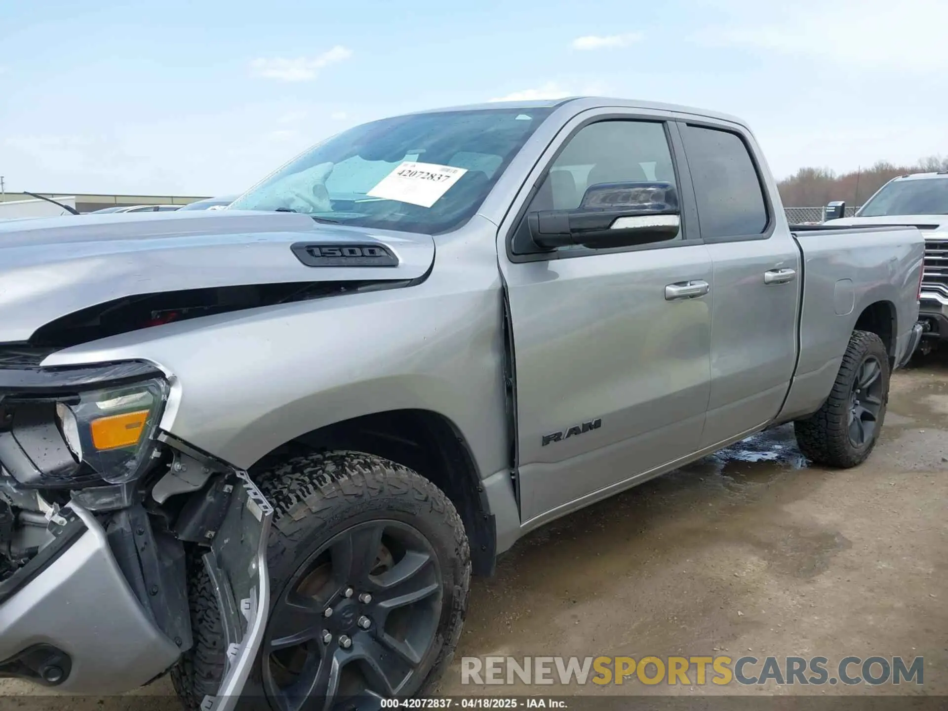 14 Photograph of a damaged car 1C6SRFBT4MN780402 RAM 1500 2021