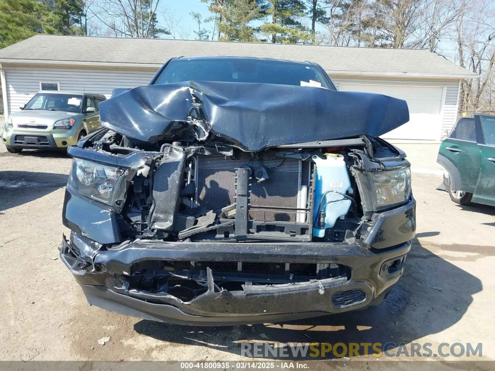 12 Photograph of a damaged car 1C6SRFBT4MN814080 RAM 1500 2021