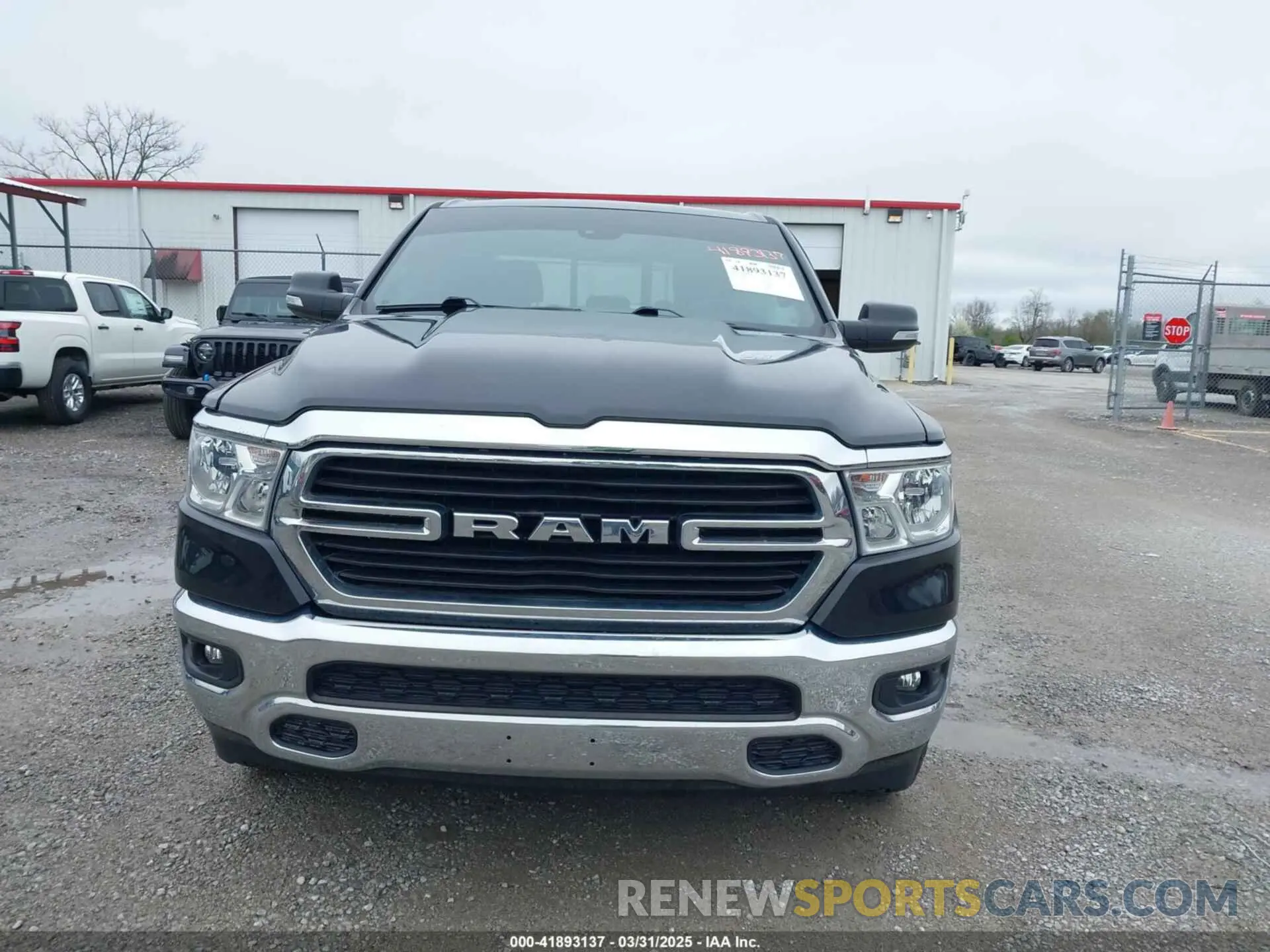 12 Photograph of a damaged car 1C6SRFBT5MN720595 RAM 1500 2021