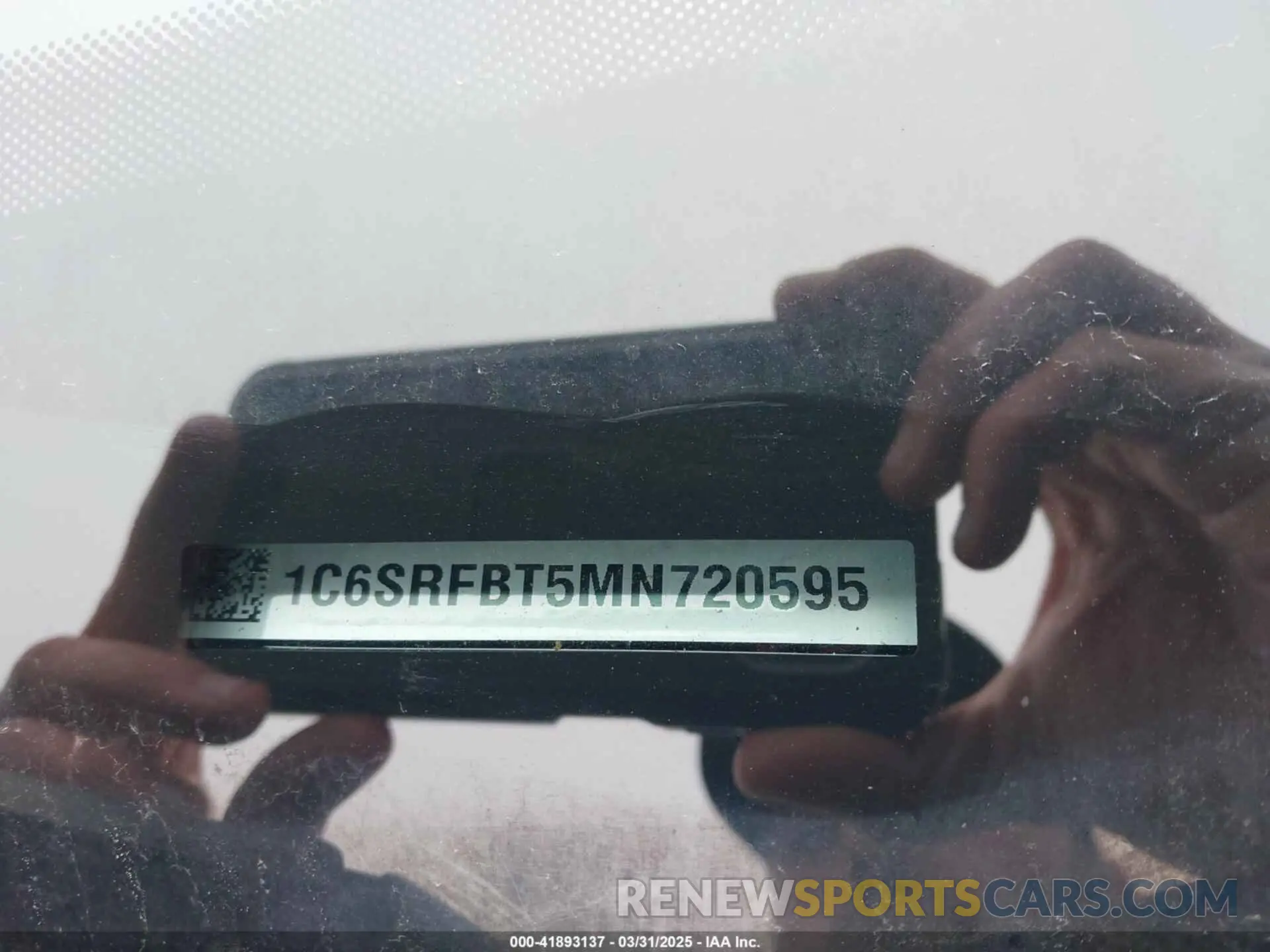 9 Photograph of a damaged car 1C6SRFBT5MN720595 RAM 1500 2021