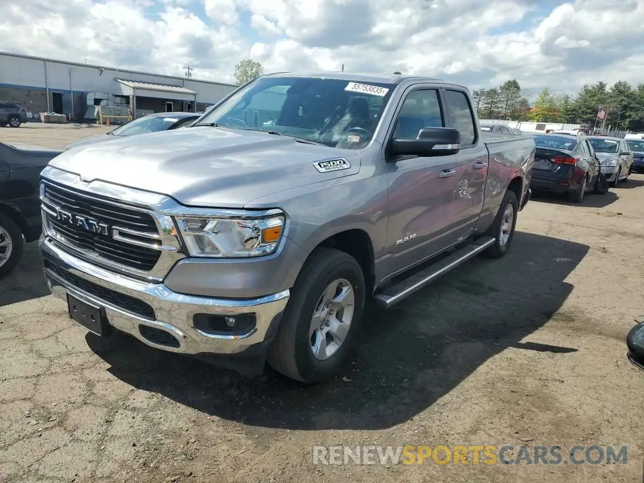 1 Photograph of a damaged car 1C6SRFBT7MN582493 RAM 1500 2021
