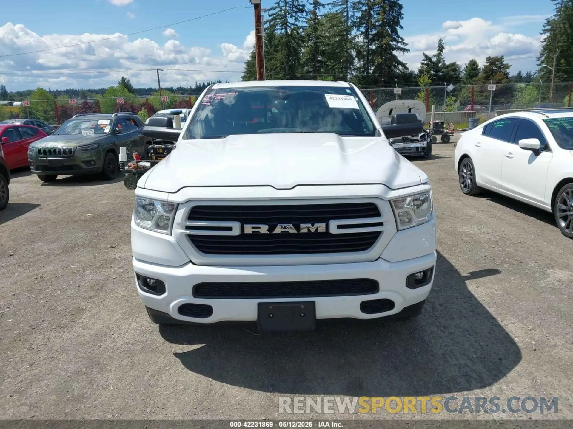 12 Photograph of a damaged car 1C6SRFBT7MN742131 RAM 1500 2021