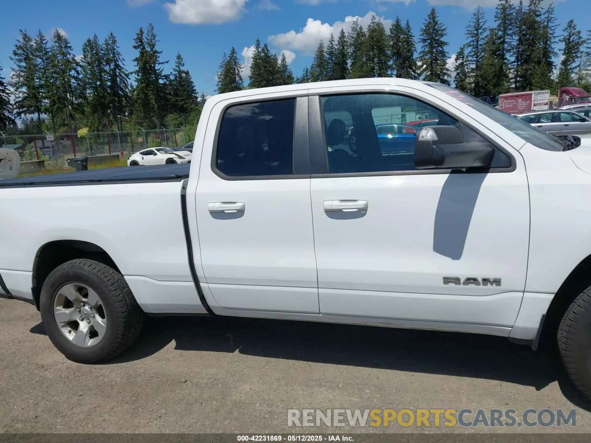 13 Photograph of a damaged car 1C6SRFBT7MN742131 RAM 1500 2021