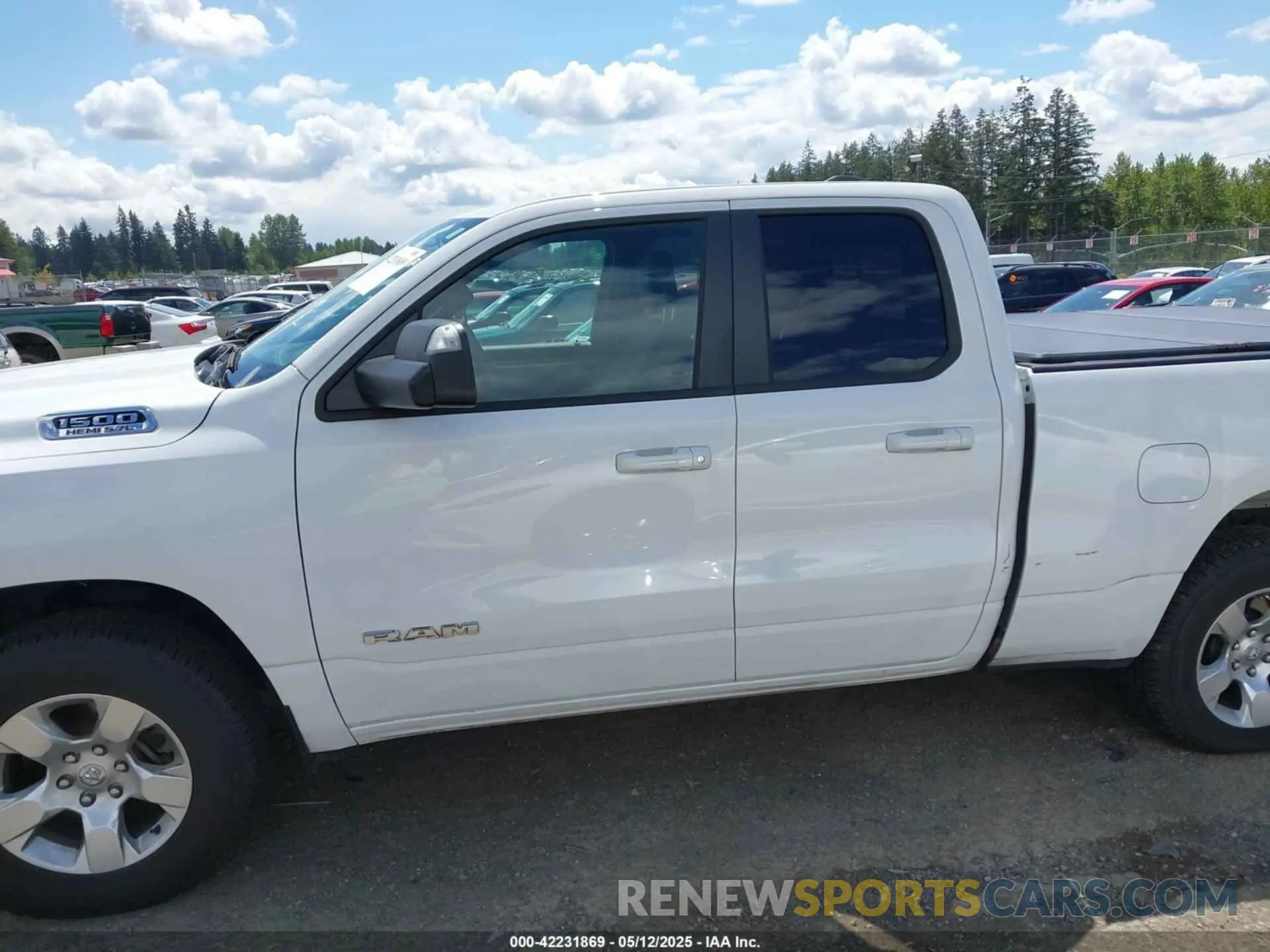 14 Photograph of a damaged car 1C6SRFBT7MN742131 RAM 1500 2021
