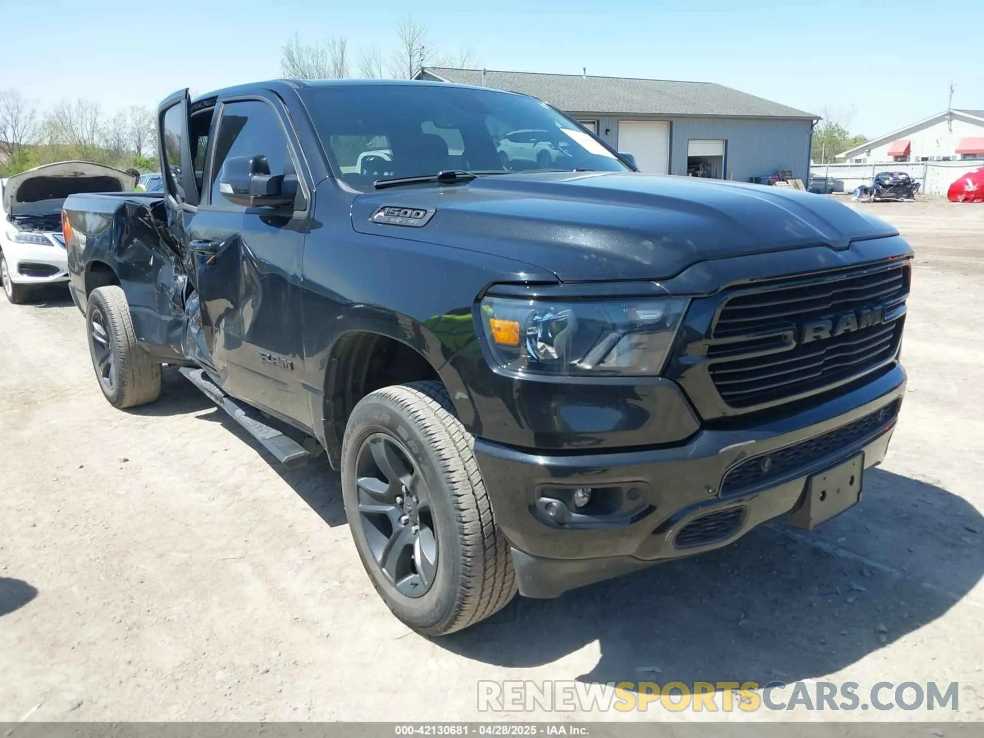 1 Photograph of a damaged car 1C6SRFBT8MN728741 RAM 1500 2021