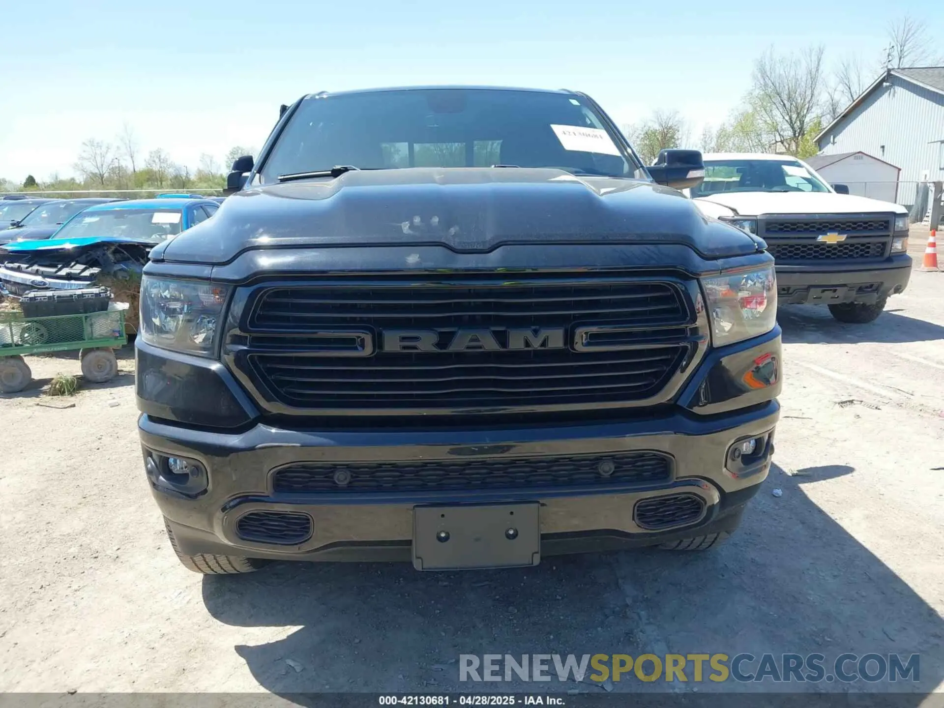 12 Photograph of a damaged car 1C6SRFBT8MN728741 RAM 1500 2021