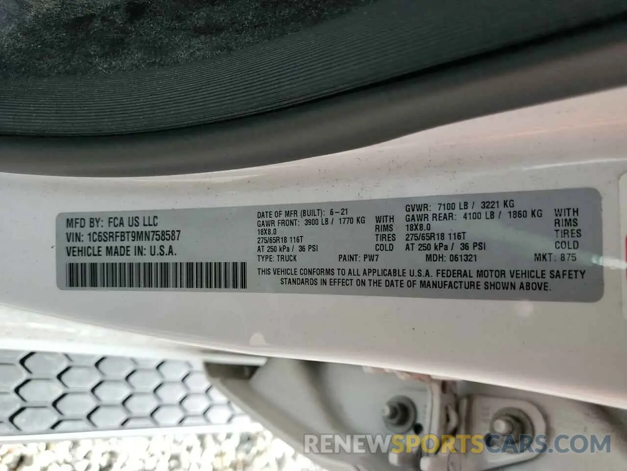 12 Photograph of a damaged car 1C6SRFBT9MN758587 RAM 1500 2021