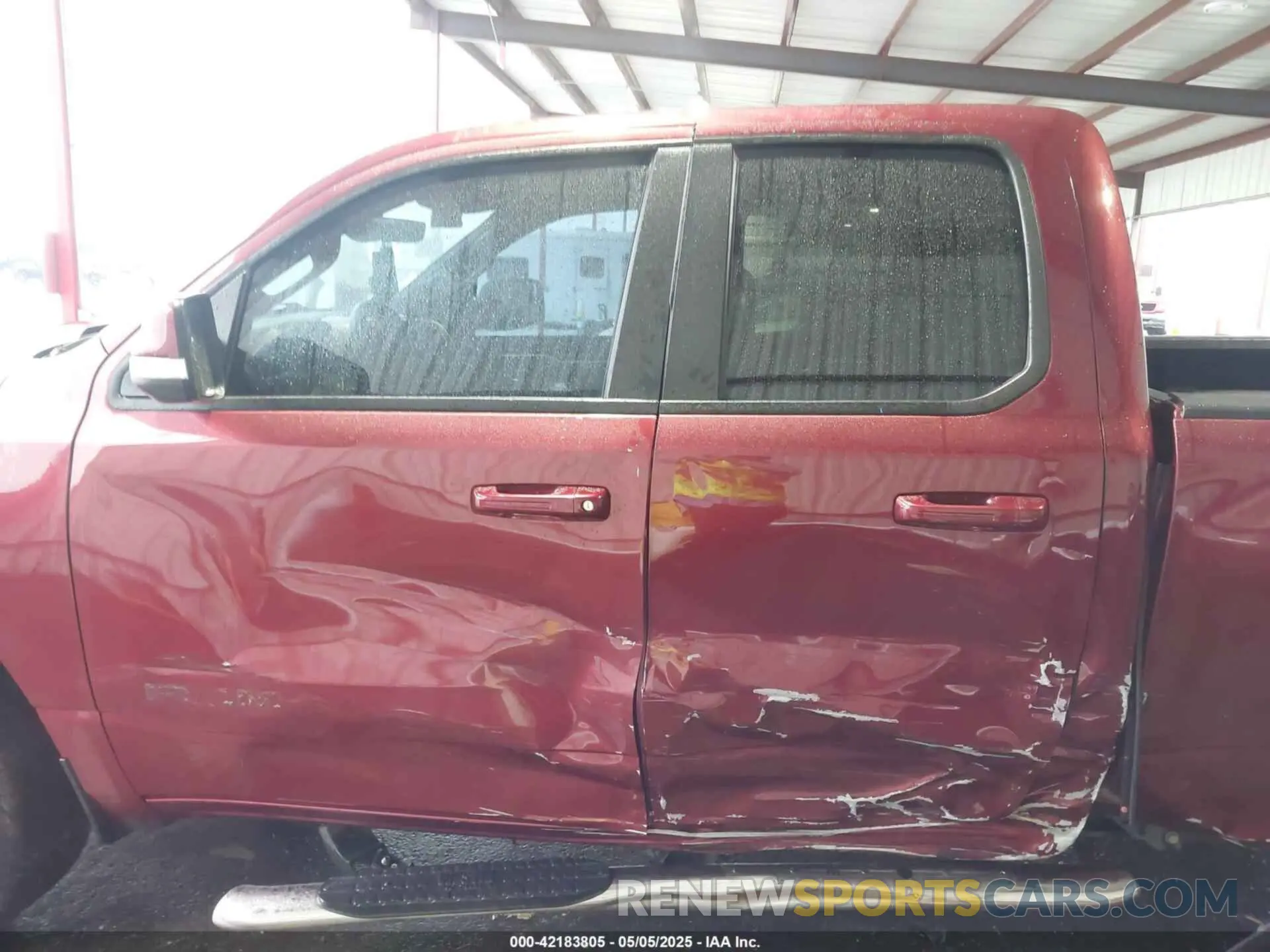 14 Photograph of a damaged car 1C6SRFBTXMN537368 RAM 1500 2021