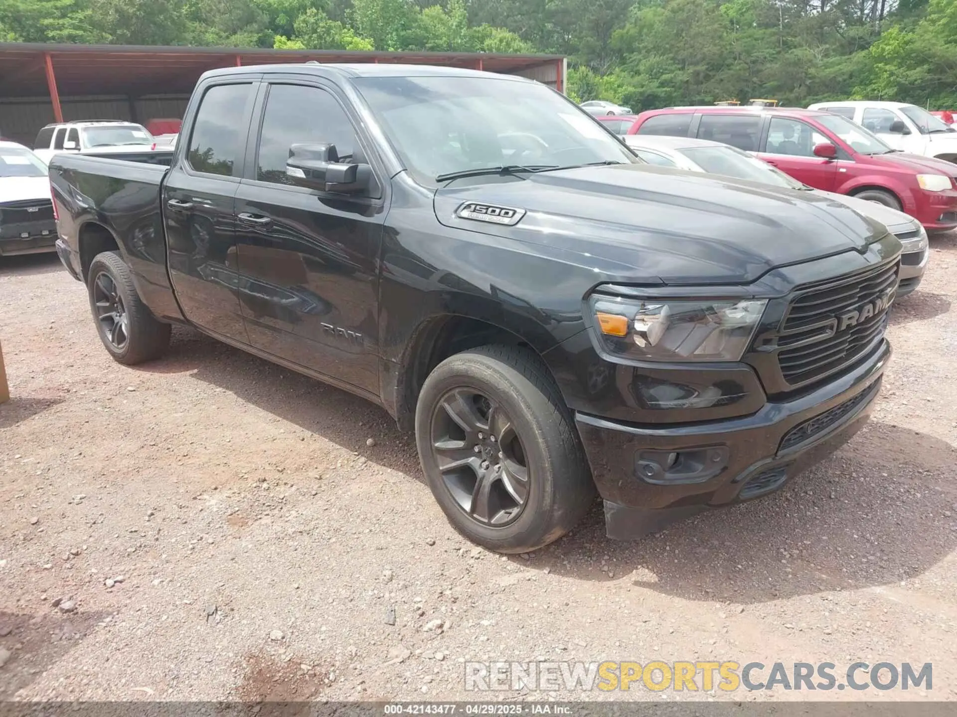 1 Photograph of a damaged car 1C6SRFBTXMN561041 RAM 1500 2021