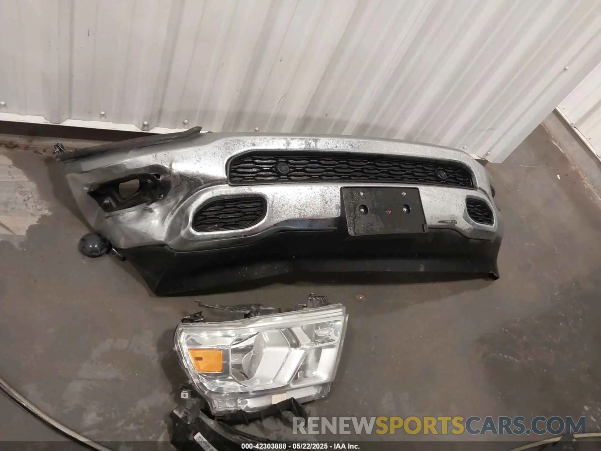 12 Photograph of a damaged car 1C6SRFBTXMN732628 RAM 1500 2021
