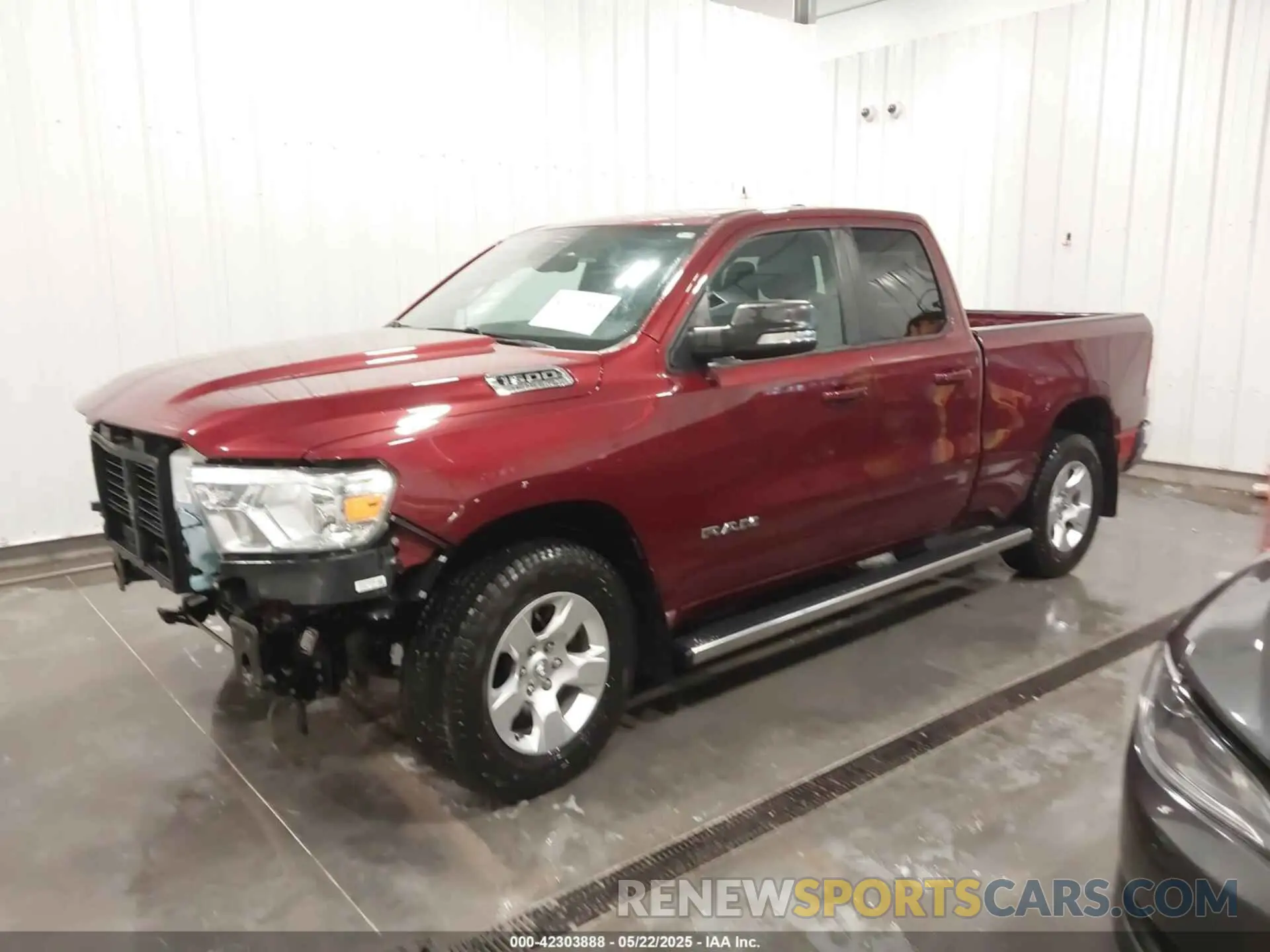 2 Photograph of a damaged car 1C6SRFBTXMN732628 RAM 1500 2021