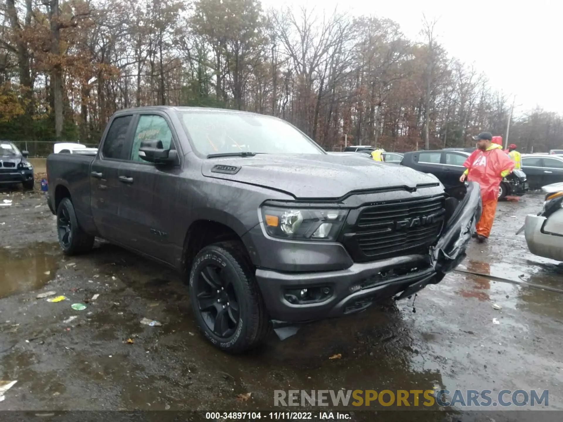 1 Photograph of a damaged car 1C6SRFBTXMN772661 RAM 1500 2021
