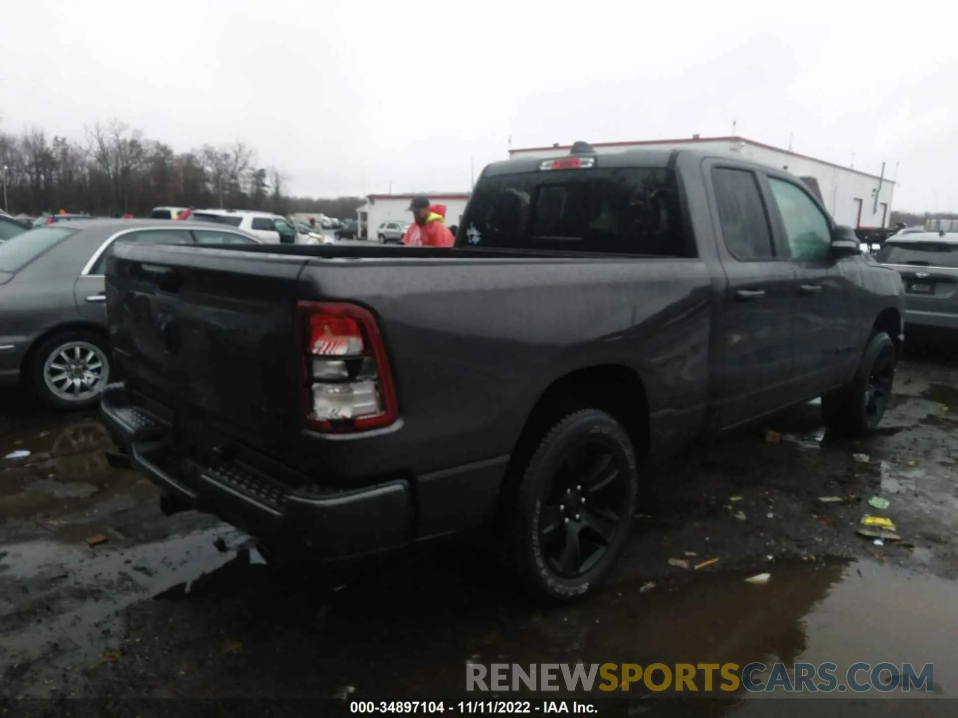 4 Photograph of a damaged car 1C6SRFBTXMN772661 RAM 1500 2021