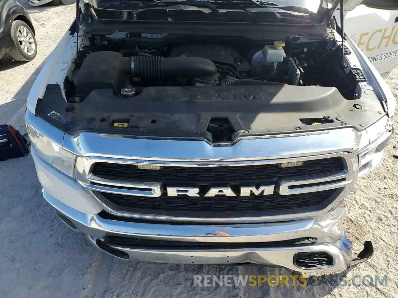 12 Photograph of a damaged car 1C6SRFCT7MN604278 RAM 1500 2021