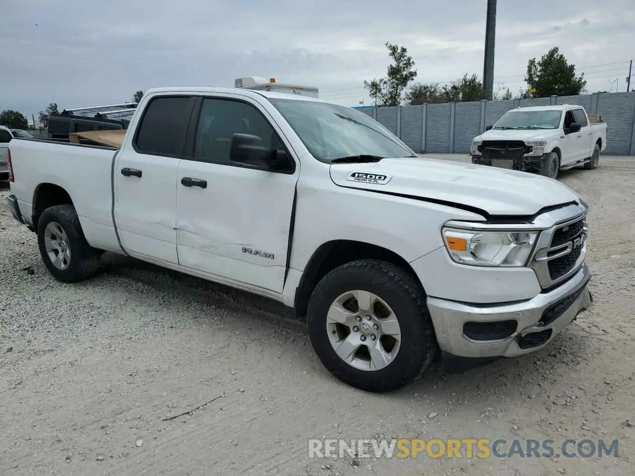 4 Photograph of a damaged car 1C6SRFCT7MN604278 RAM 1500 2021