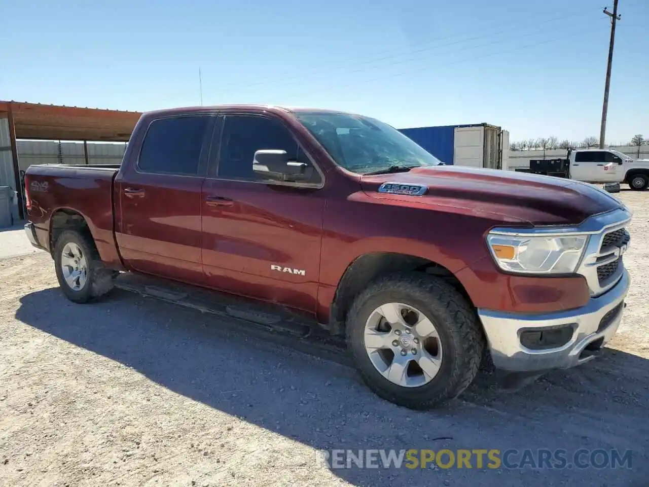 4 Photograph of a damaged car 1C6SRFFM8MN706144 RAM 1500 2021