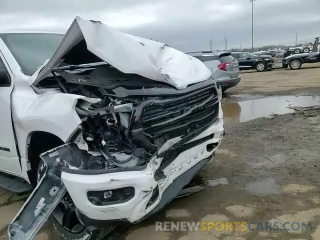 11 Photograph of a damaged car 1C6SRFFT0MN508939 RAM 1500 2021