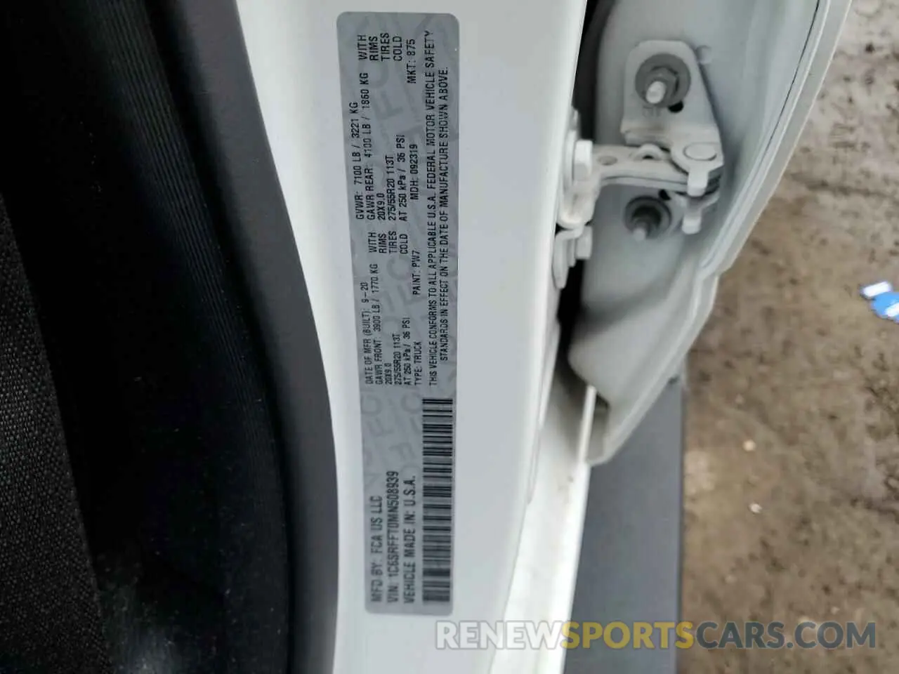 14 Photograph of a damaged car 1C6SRFFT0MN508939 RAM 1500 2021
