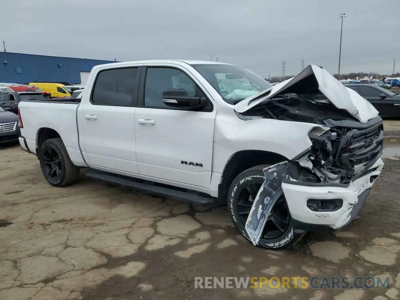 4 Photograph of a damaged car 1C6SRFFT0MN508939 RAM 1500 2021
