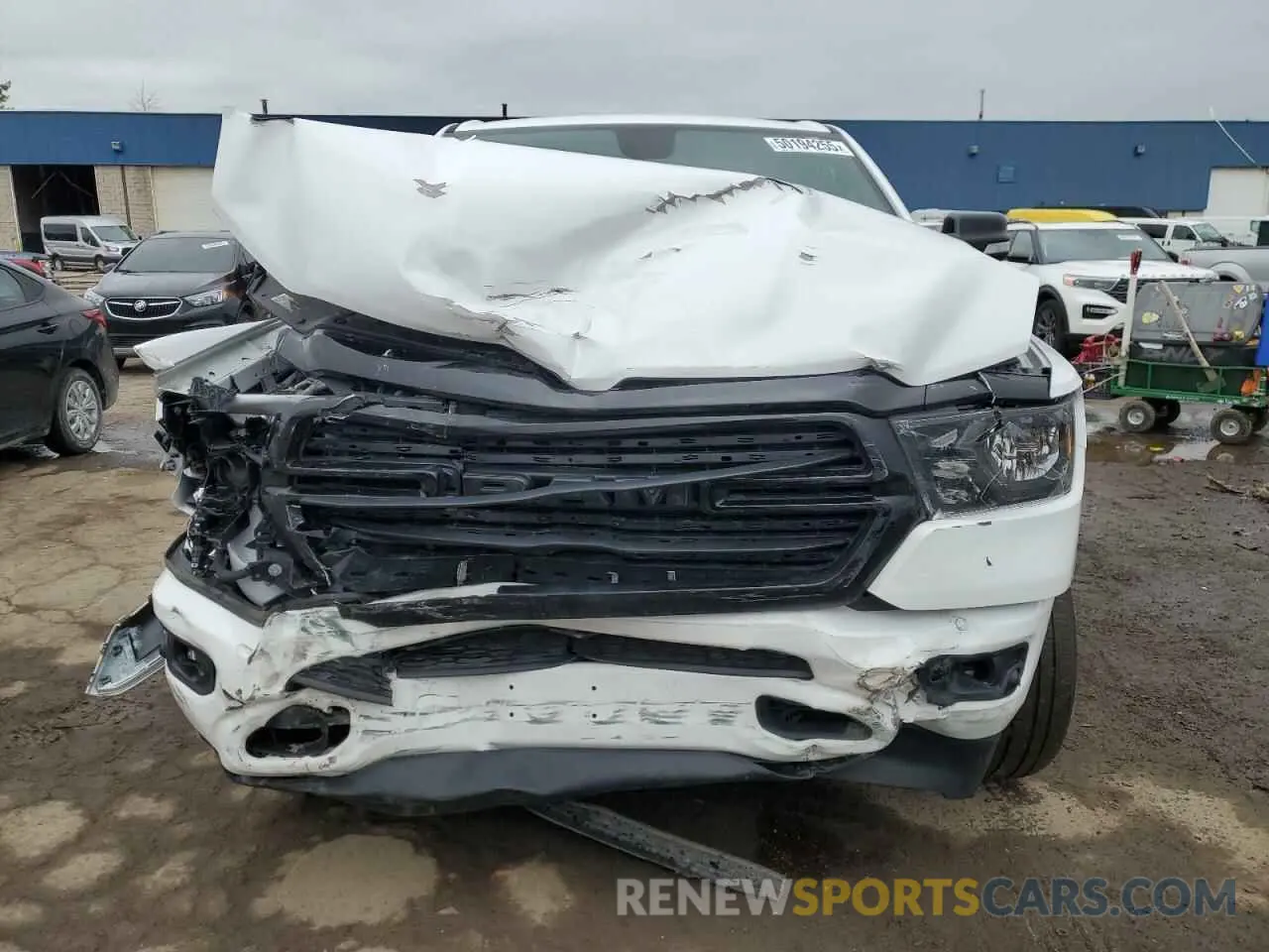 5 Photograph of a damaged car 1C6SRFFT0MN508939 RAM 1500 2021