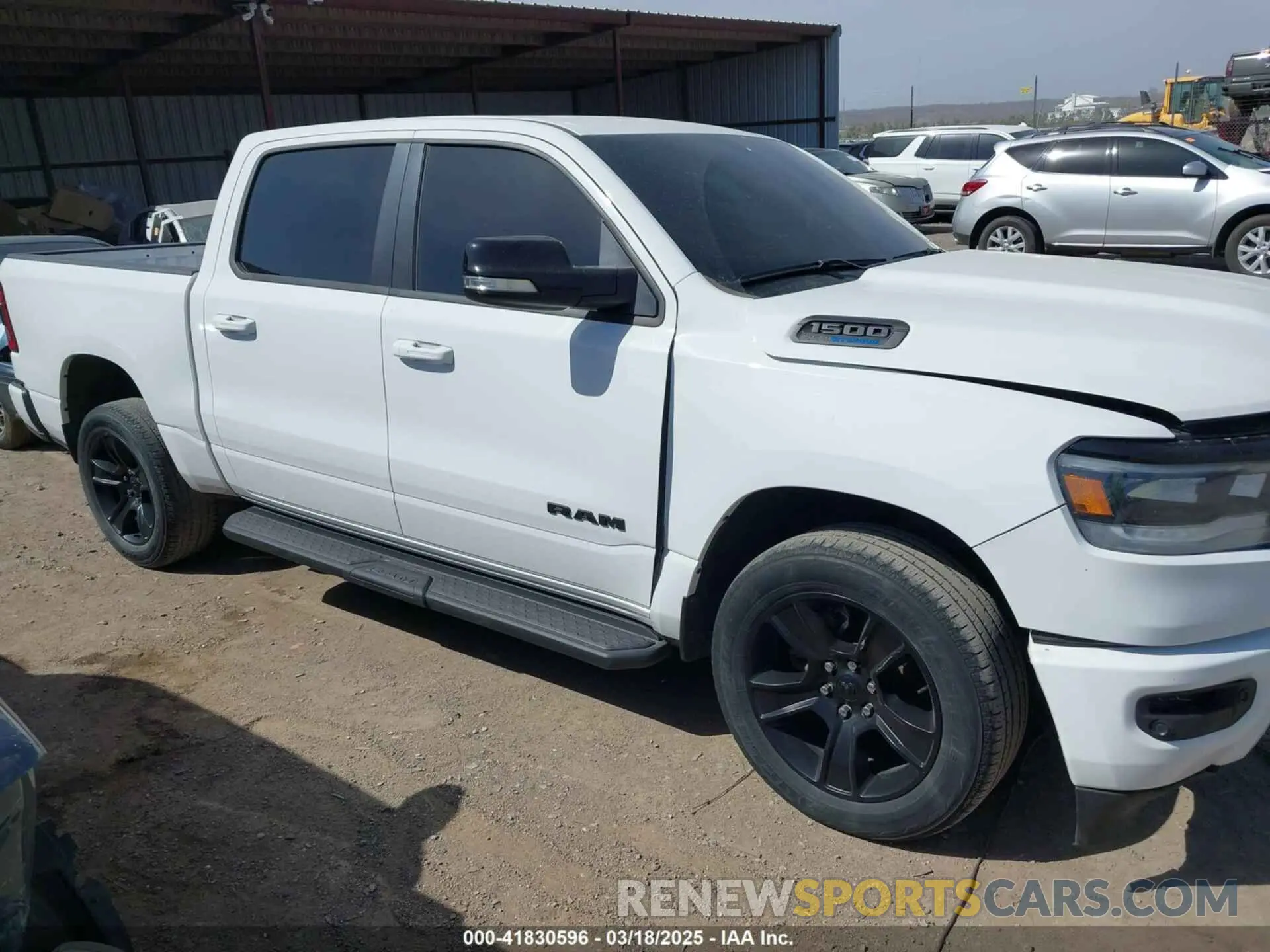 1 Photograph of a damaged car 1C6SRFFT0MN521027 RAM 1500 2021