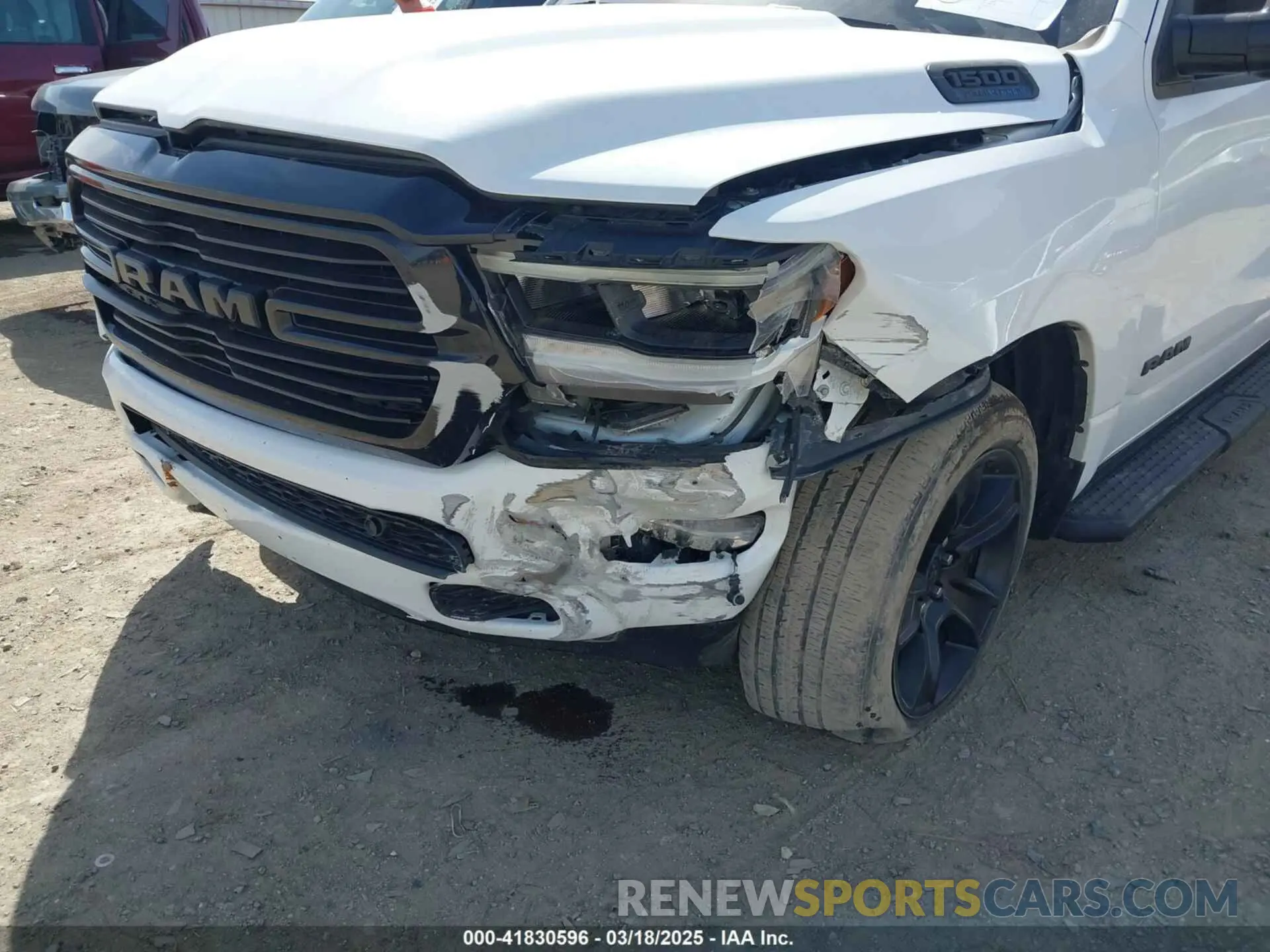 12 Photograph of a damaged car 1C6SRFFT0MN521027 RAM 1500 2021