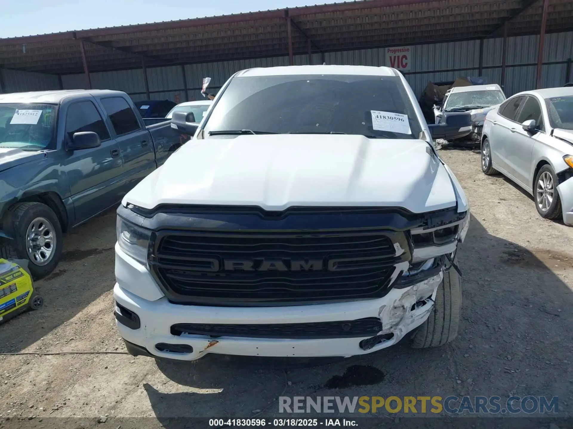 13 Photograph of a damaged car 1C6SRFFT0MN521027 RAM 1500 2021