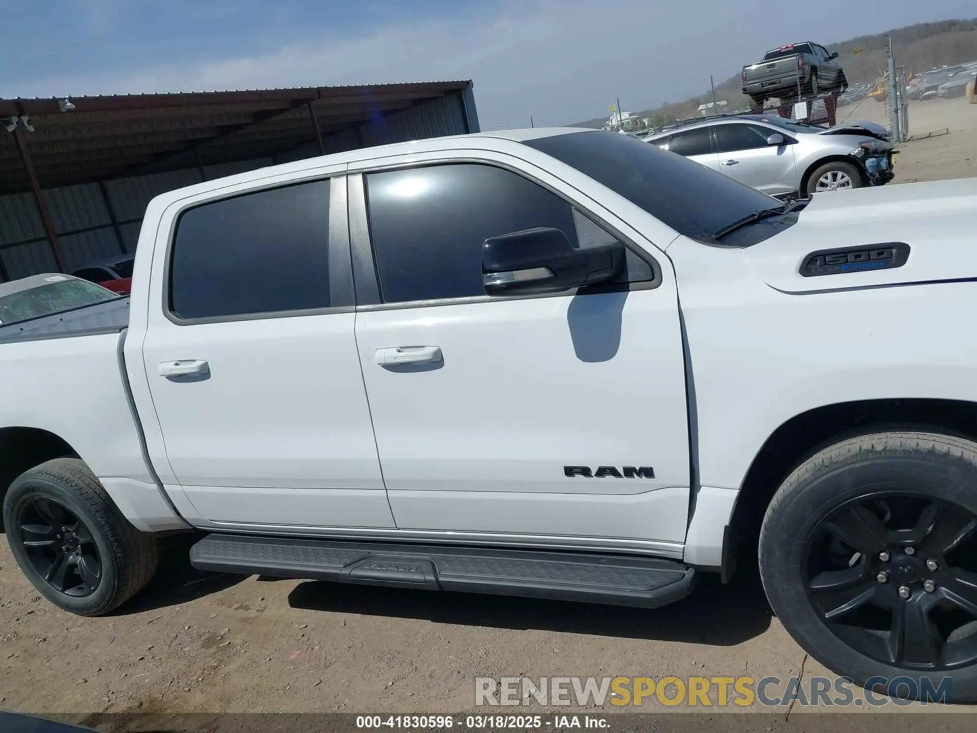 14 Photograph of a damaged car 1C6SRFFT0MN521027 RAM 1500 2021