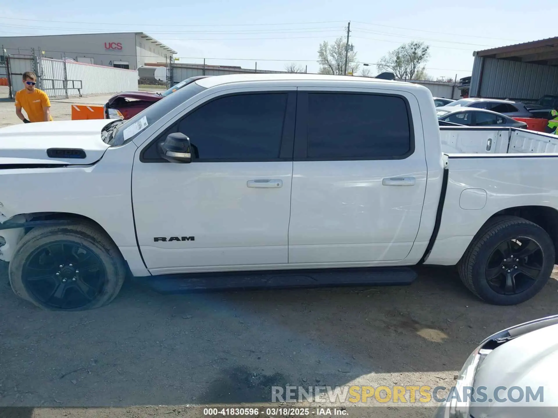 15 Photograph of a damaged car 1C6SRFFT0MN521027 RAM 1500 2021