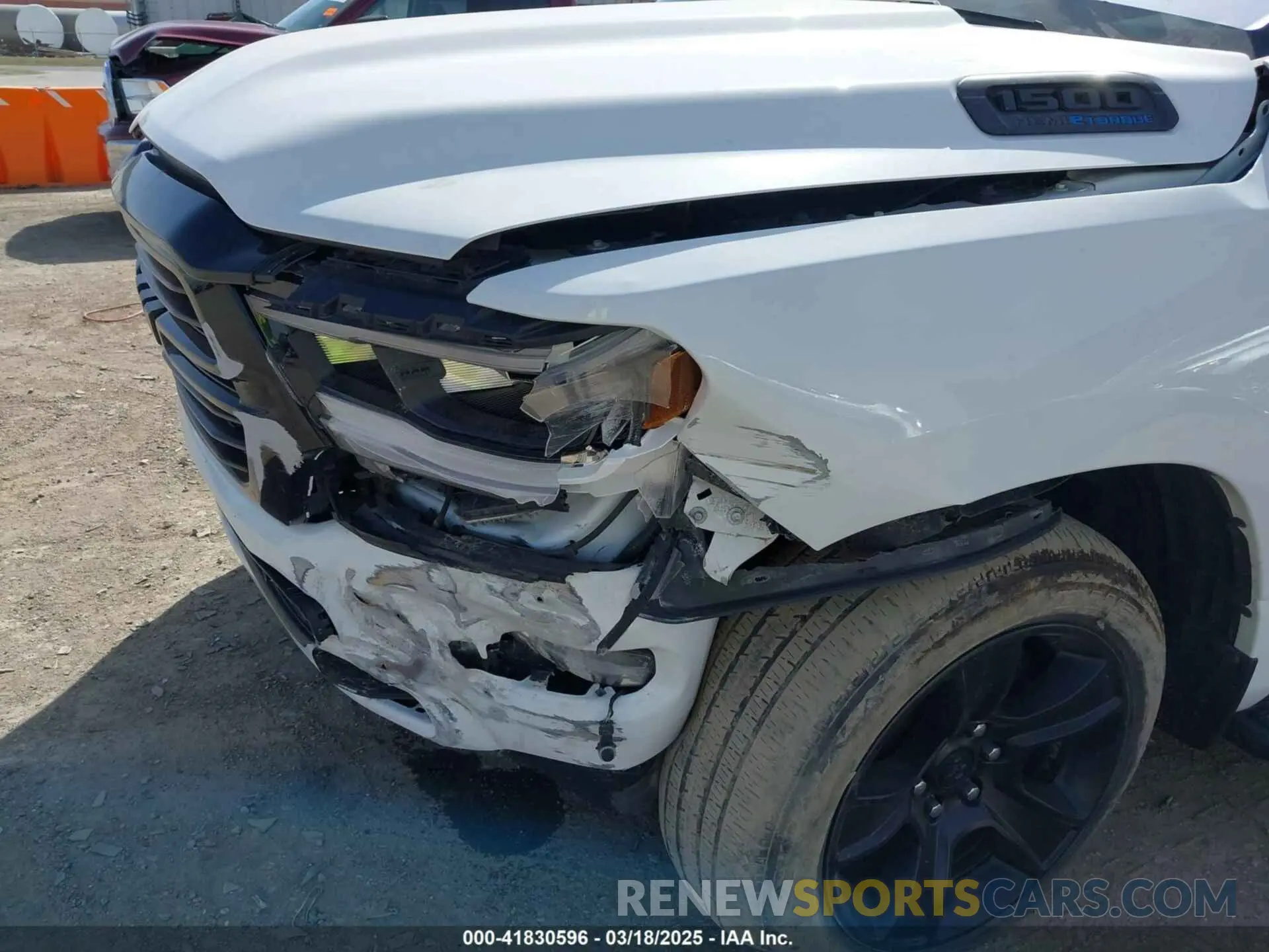 18 Photograph of a damaged car 1C6SRFFT0MN521027 RAM 1500 2021