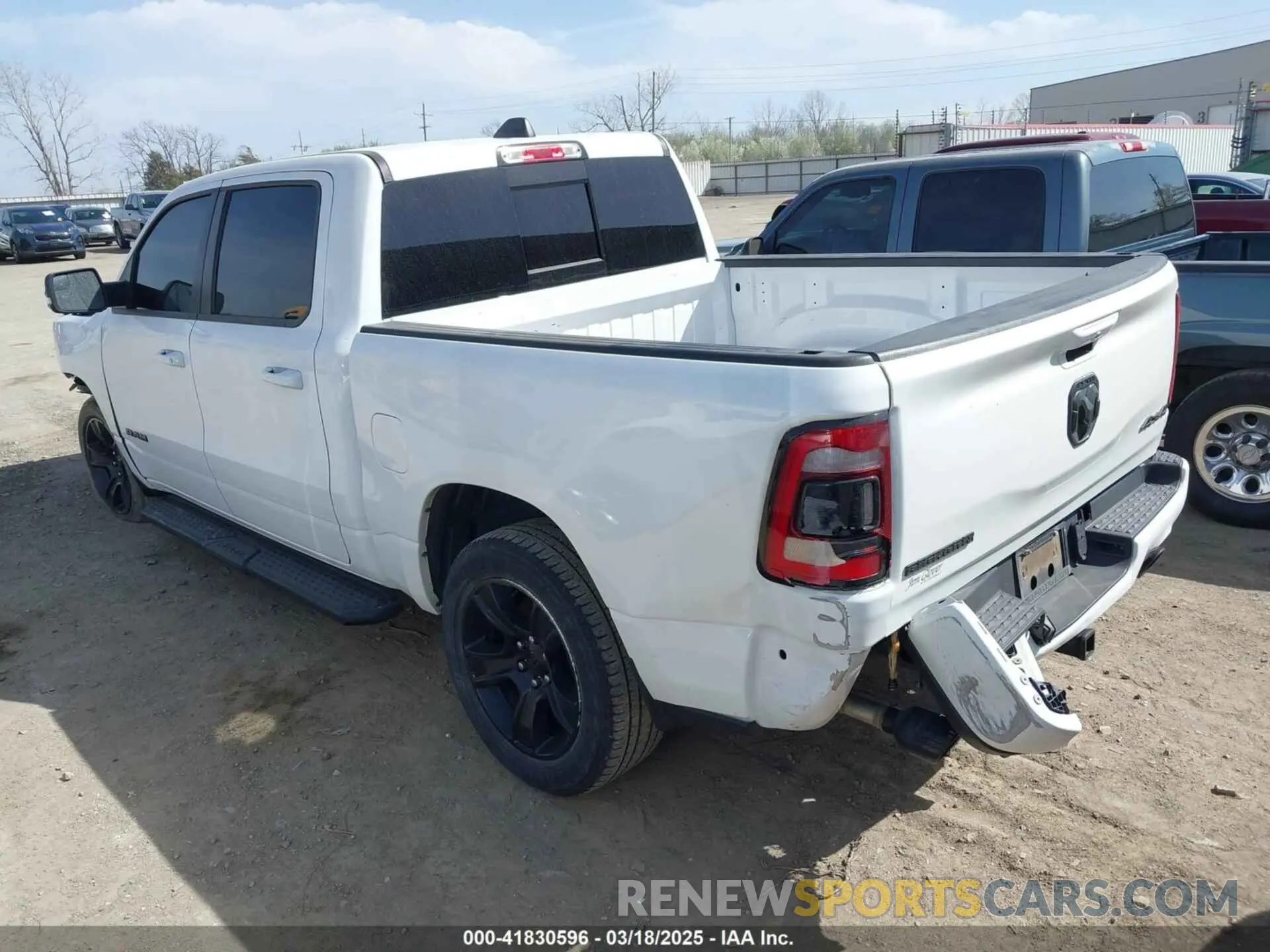 3 Photograph of a damaged car 1C6SRFFT0MN521027 RAM 1500 2021