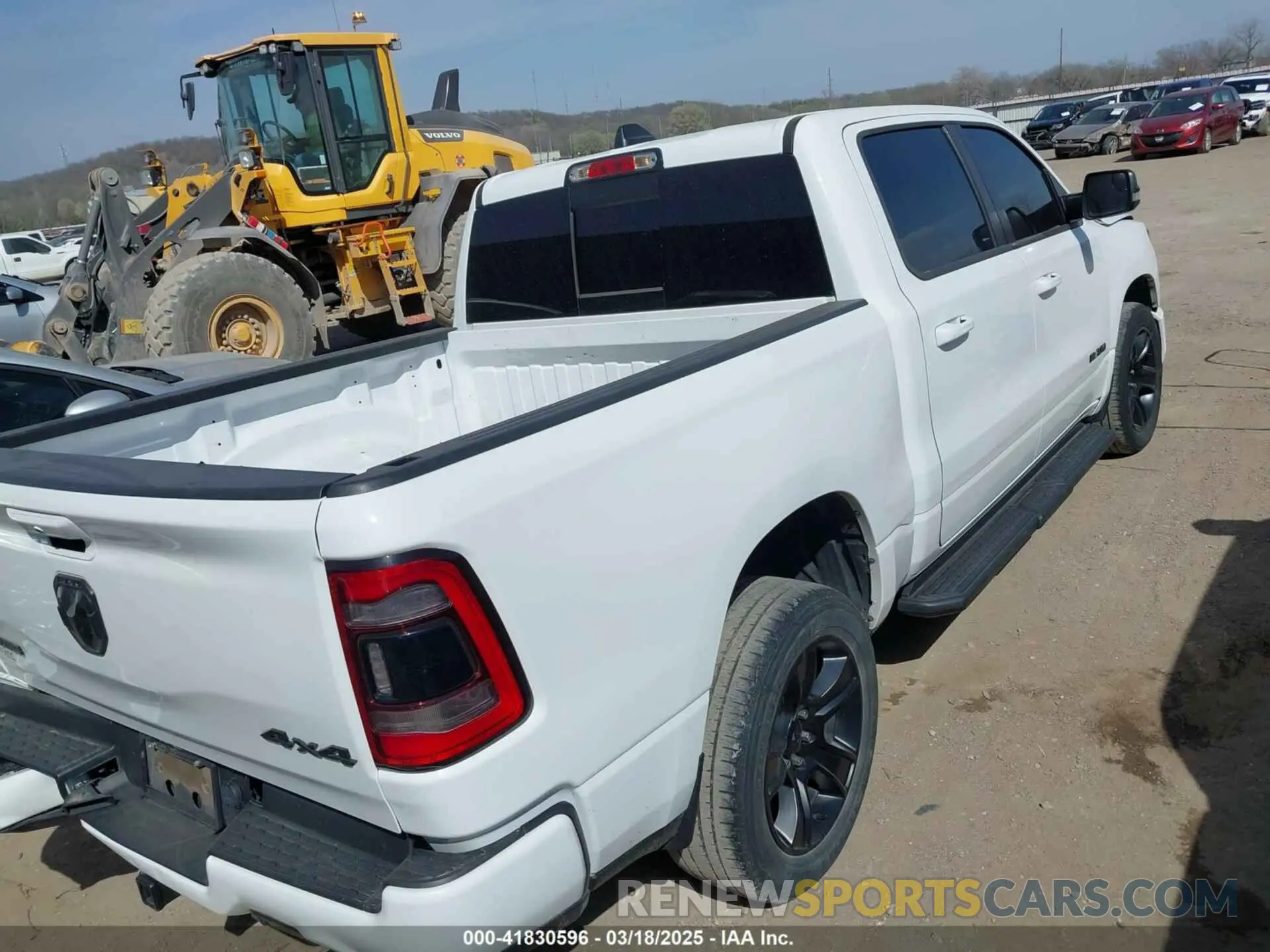 4 Photograph of a damaged car 1C6SRFFT0MN521027 RAM 1500 2021