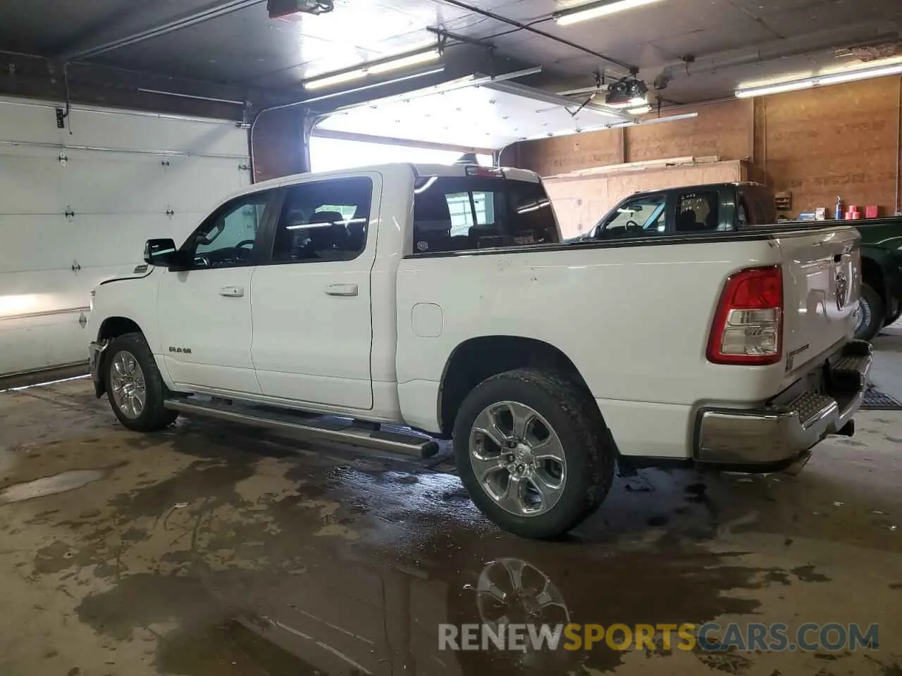 2 Photograph of a damaged car 1C6SRFFT0MN662146 RAM 1500 2021