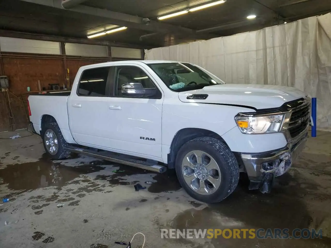 4 Photograph of a damaged car 1C6SRFFT0MN662146 RAM 1500 2021