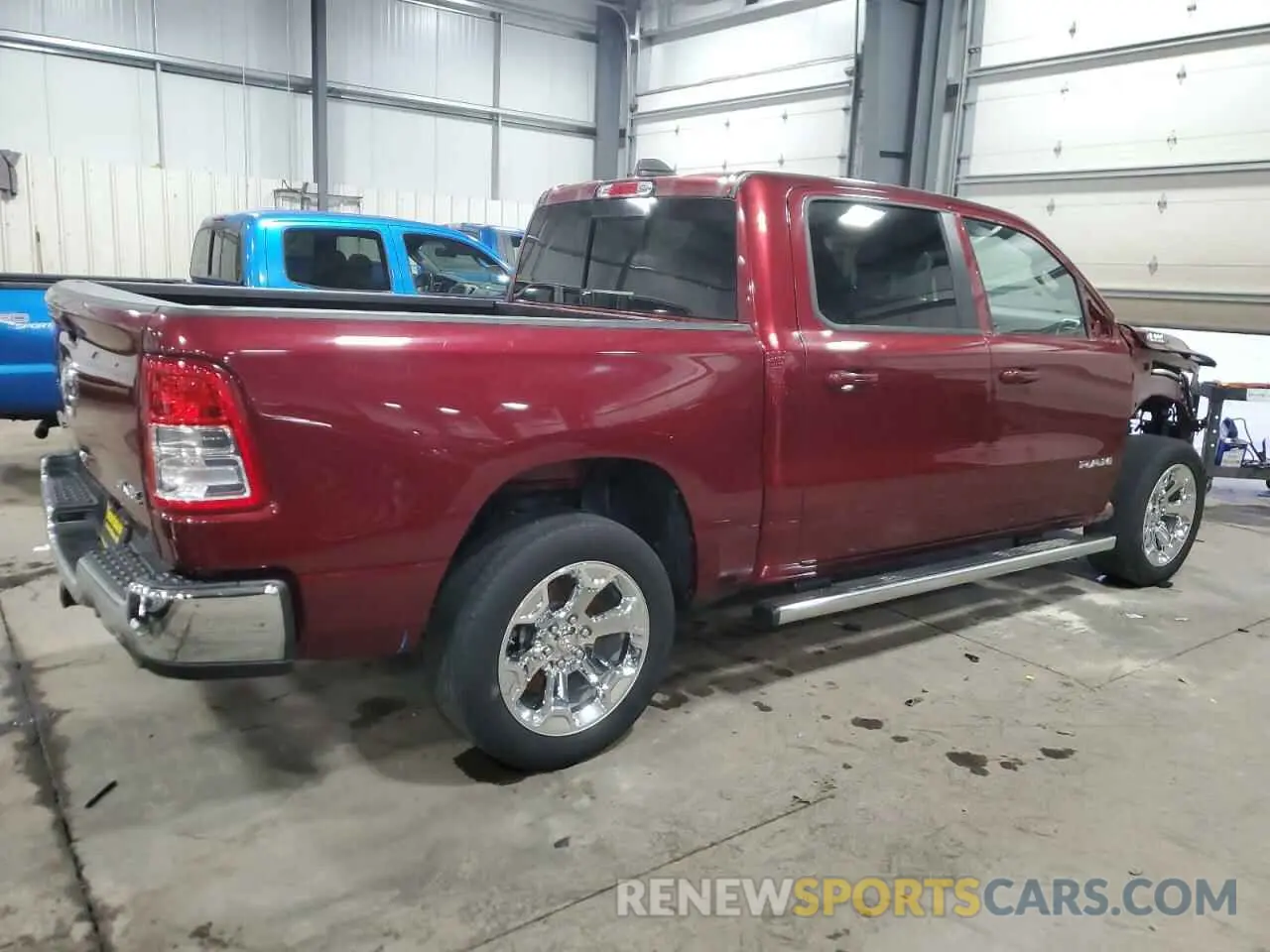 3 Photograph of a damaged car 1C6SRFFT0MN723639 RAM 1500 2021