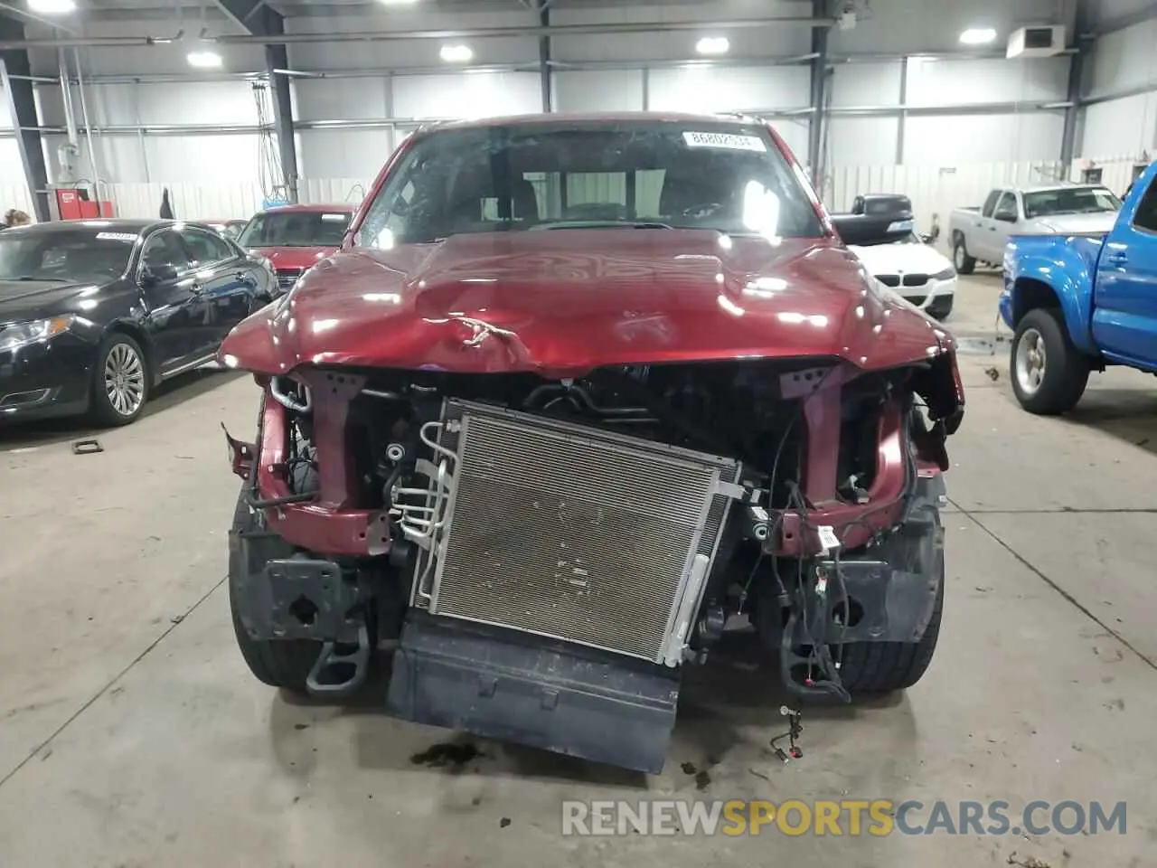 5 Photograph of a damaged car 1C6SRFFT0MN723639 RAM 1500 2021
