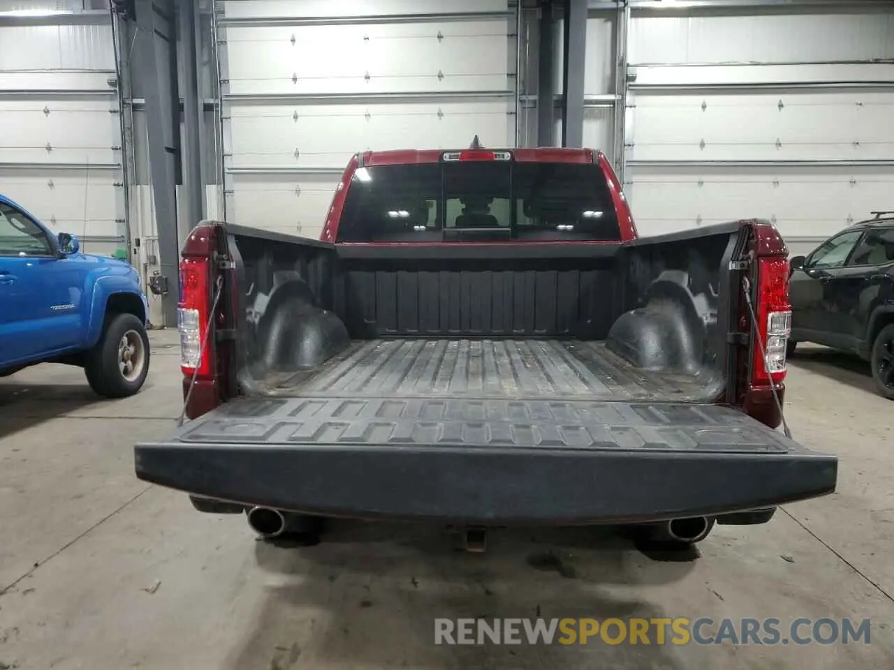 6 Photograph of a damaged car 1C6SRFFT0MN723639 RAM 1500 2021