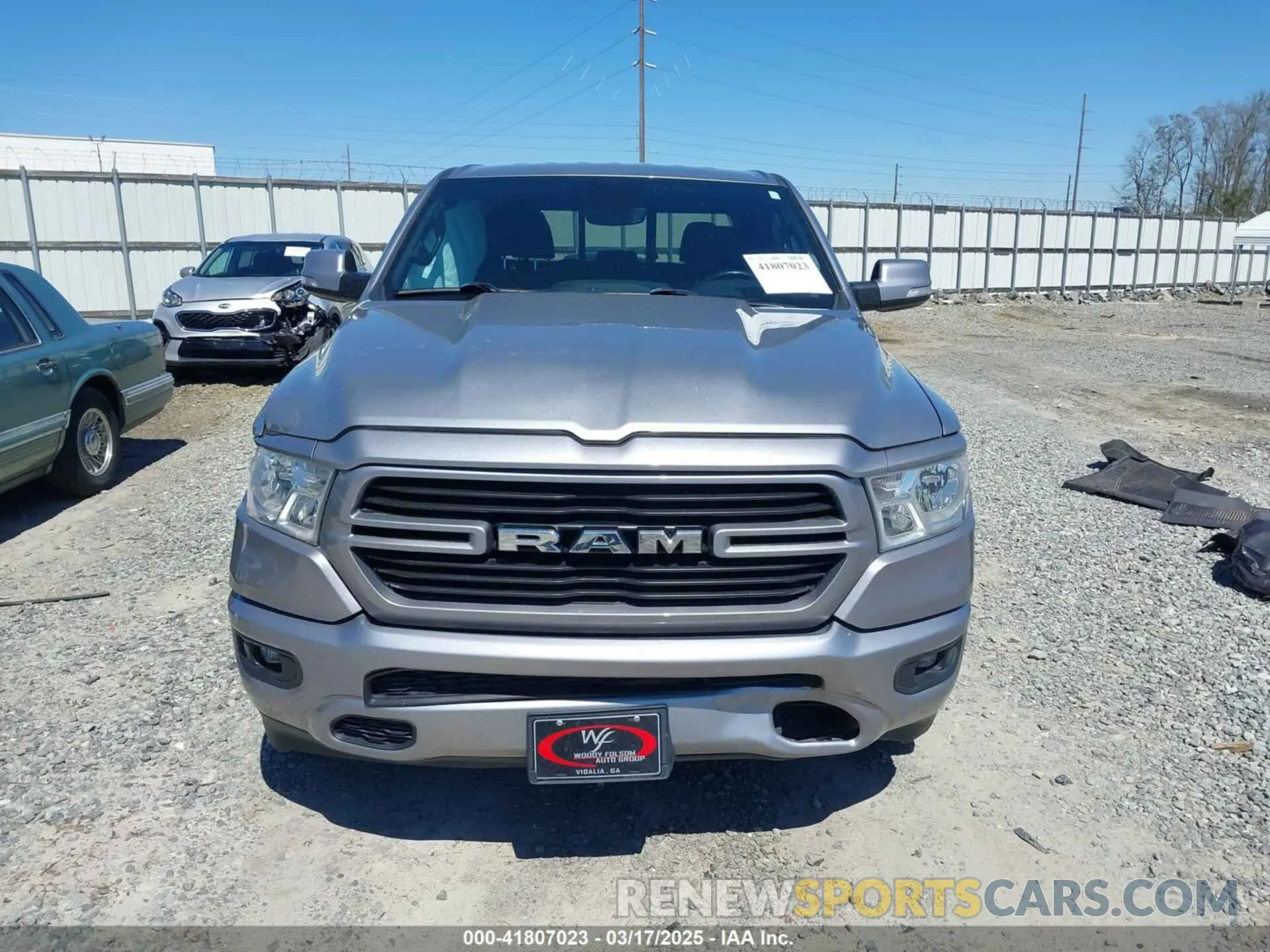 12 Photograph of a damaged car 1C6SRFFT0MN758262 RAM 1500 2021