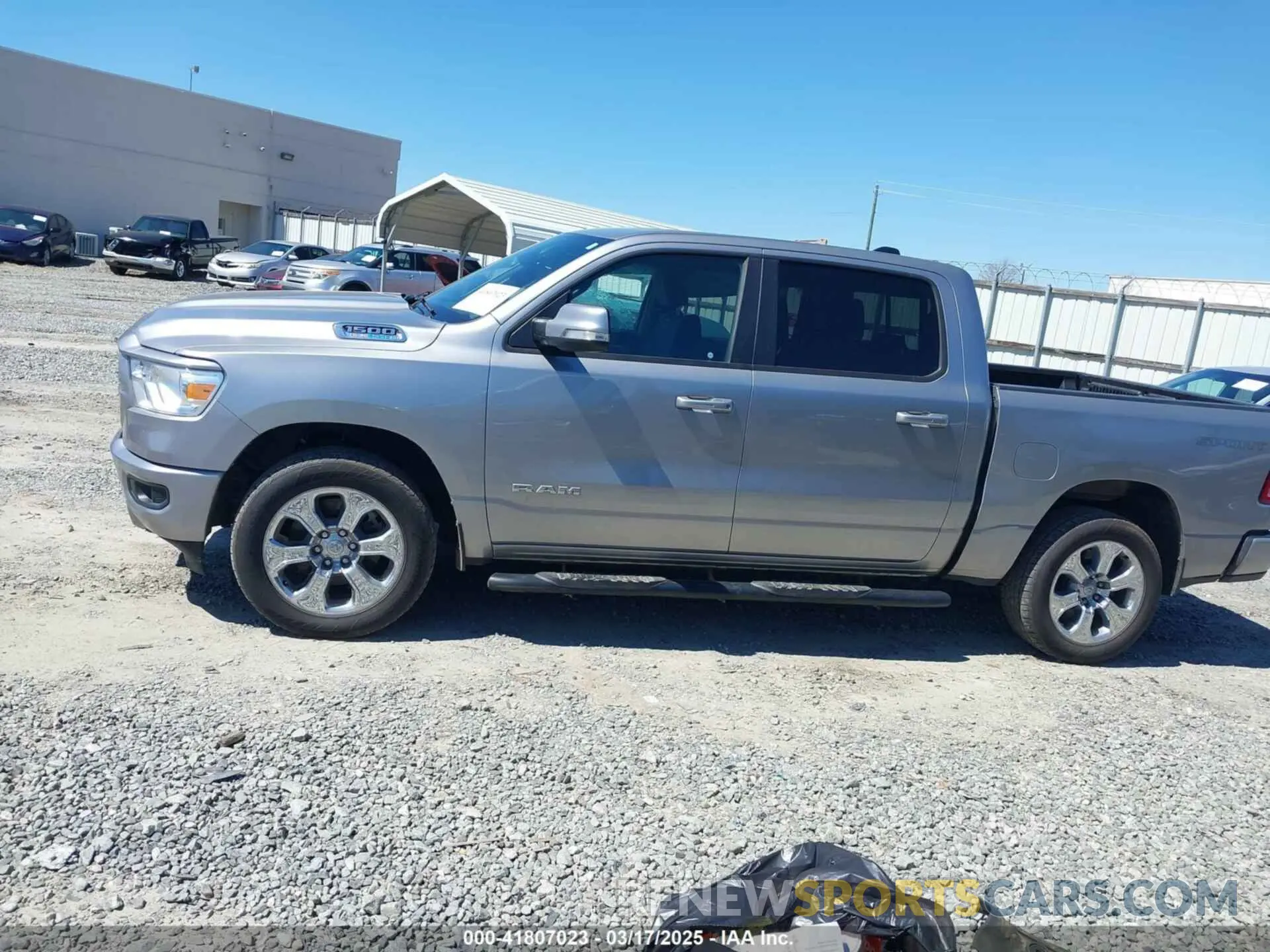 14 Photograph of a damaged car 1C6SRFFT0MN758262 RAM 1500 2021