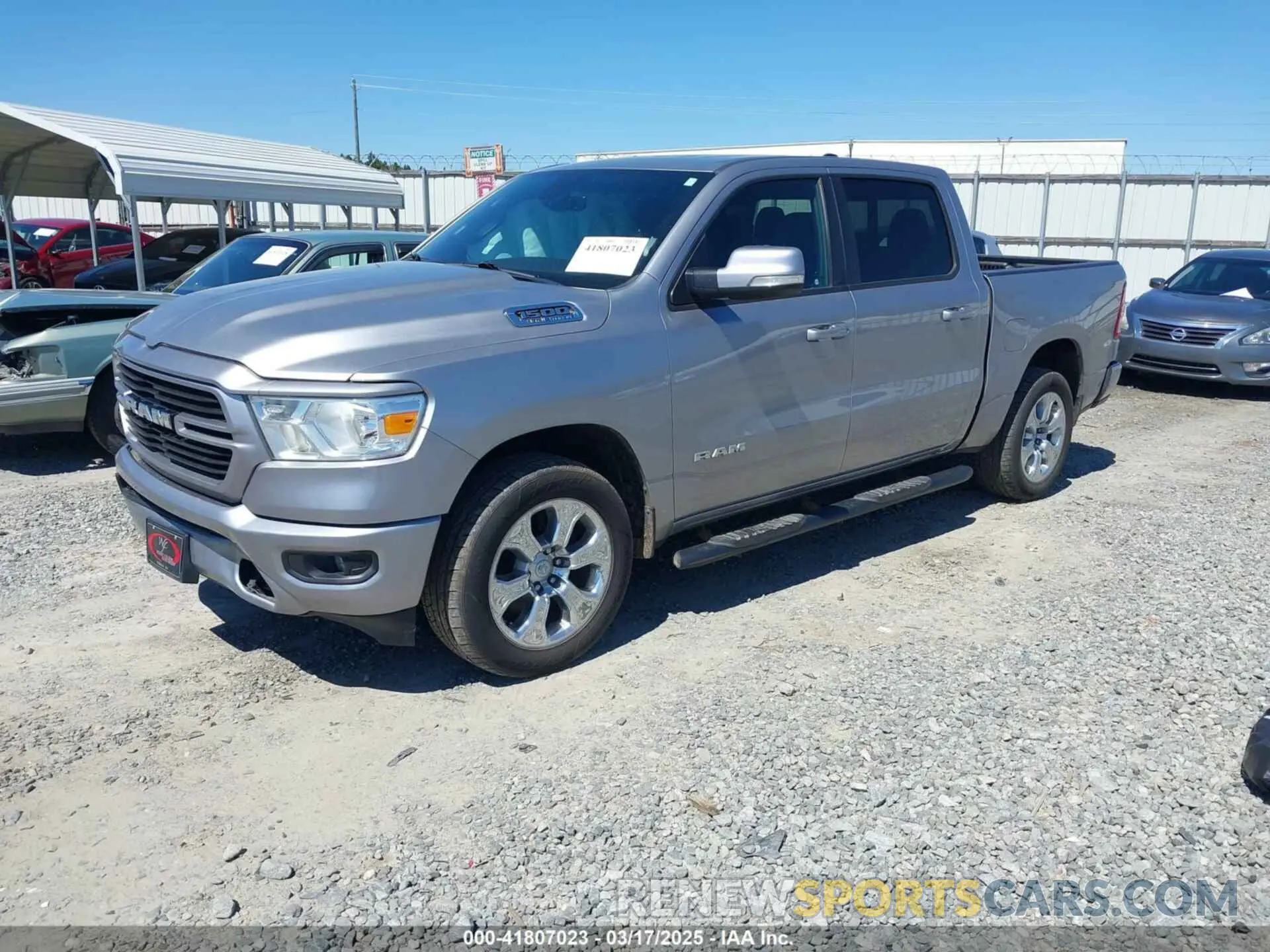 2 Photograph of a damaged car 1C6SRFFT0MN758262 RAM 1500 2021