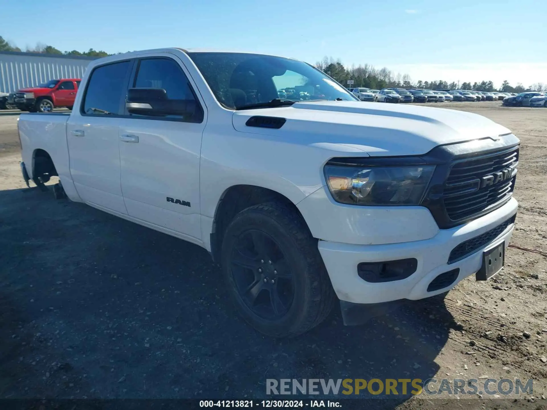 1 Photograph of a damaged car 1C6SRFFT1MN509467 RAM 1500 2021
