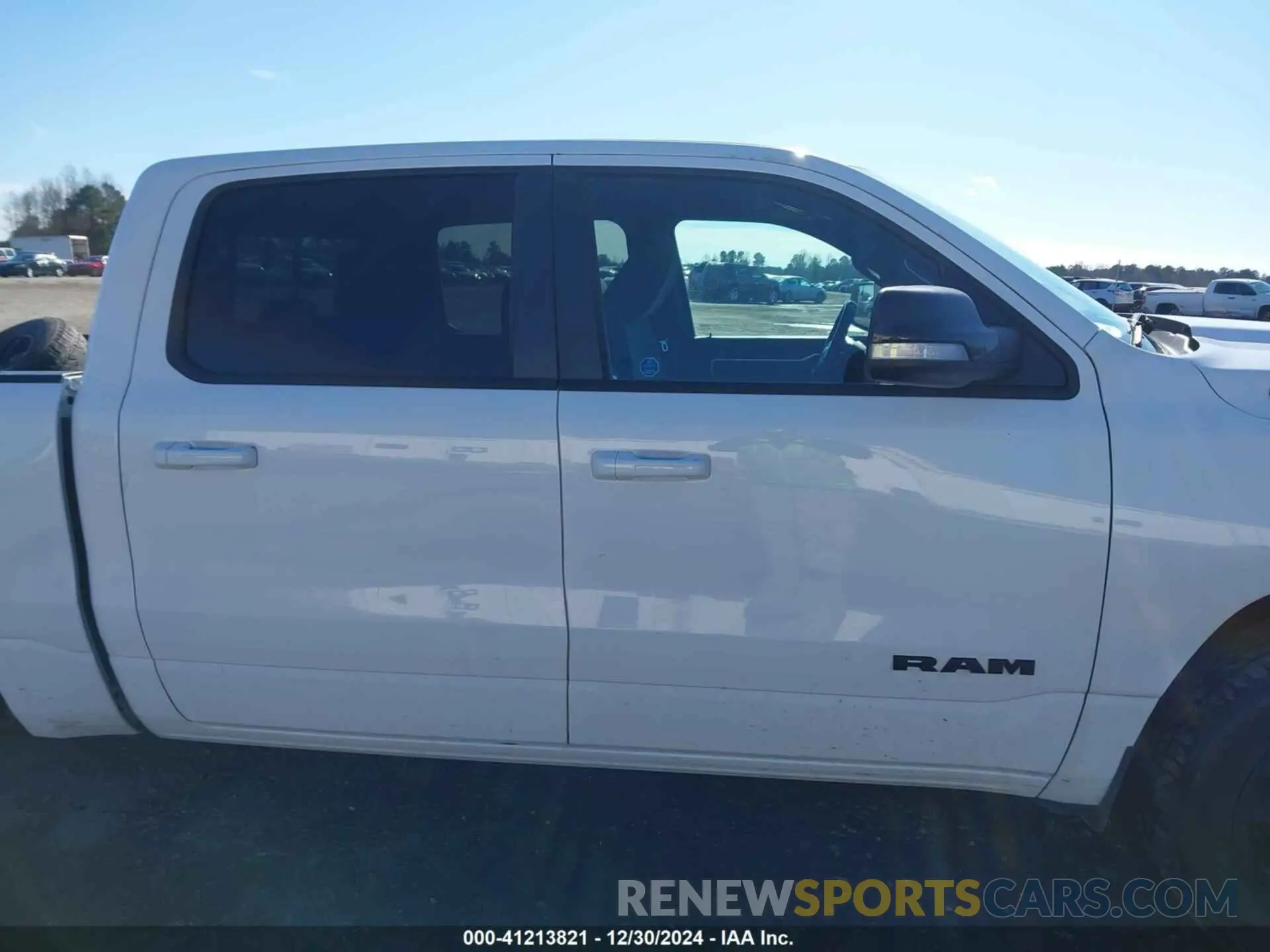 14 Photograph of a damaged car 1C6SRFFT1MN509467 RAM 1500 2021