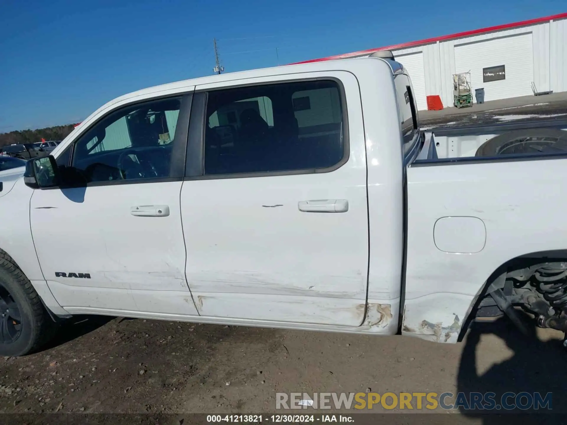 15 Photograph of a damaged car 1C6SRFFT1MN509467 RAM 1500 2021