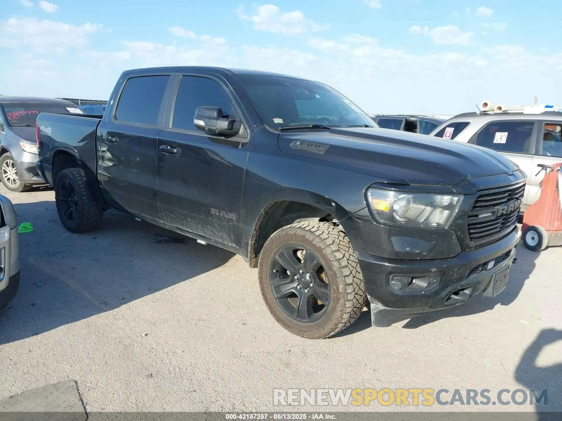 1 Photograph of a damaged car 1C6SRFFT1MN520081 RAM 1500 2021