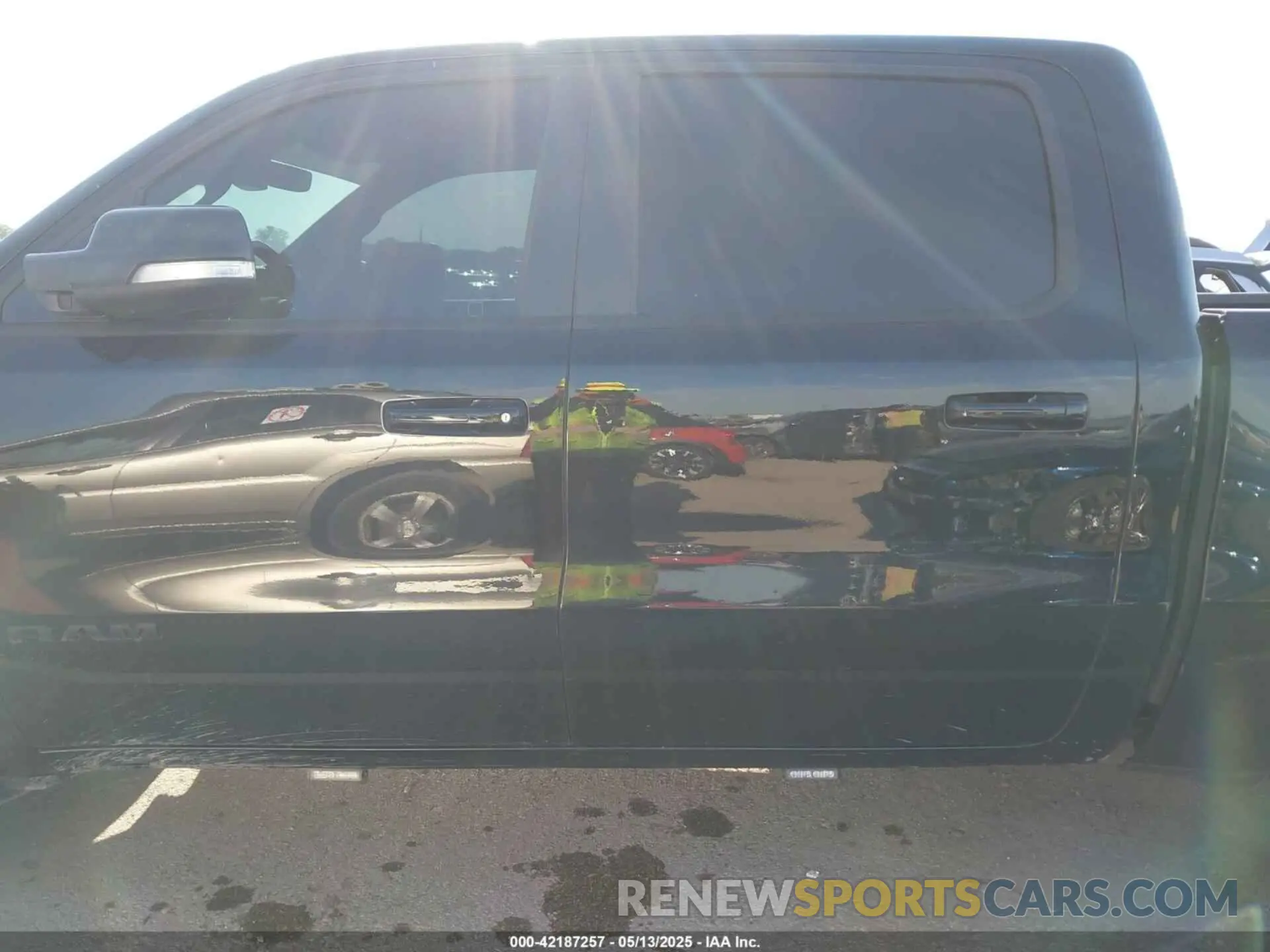 14 Photograph of a damaged car 1C6SRFFT1MN520081 RAM 1500 2021