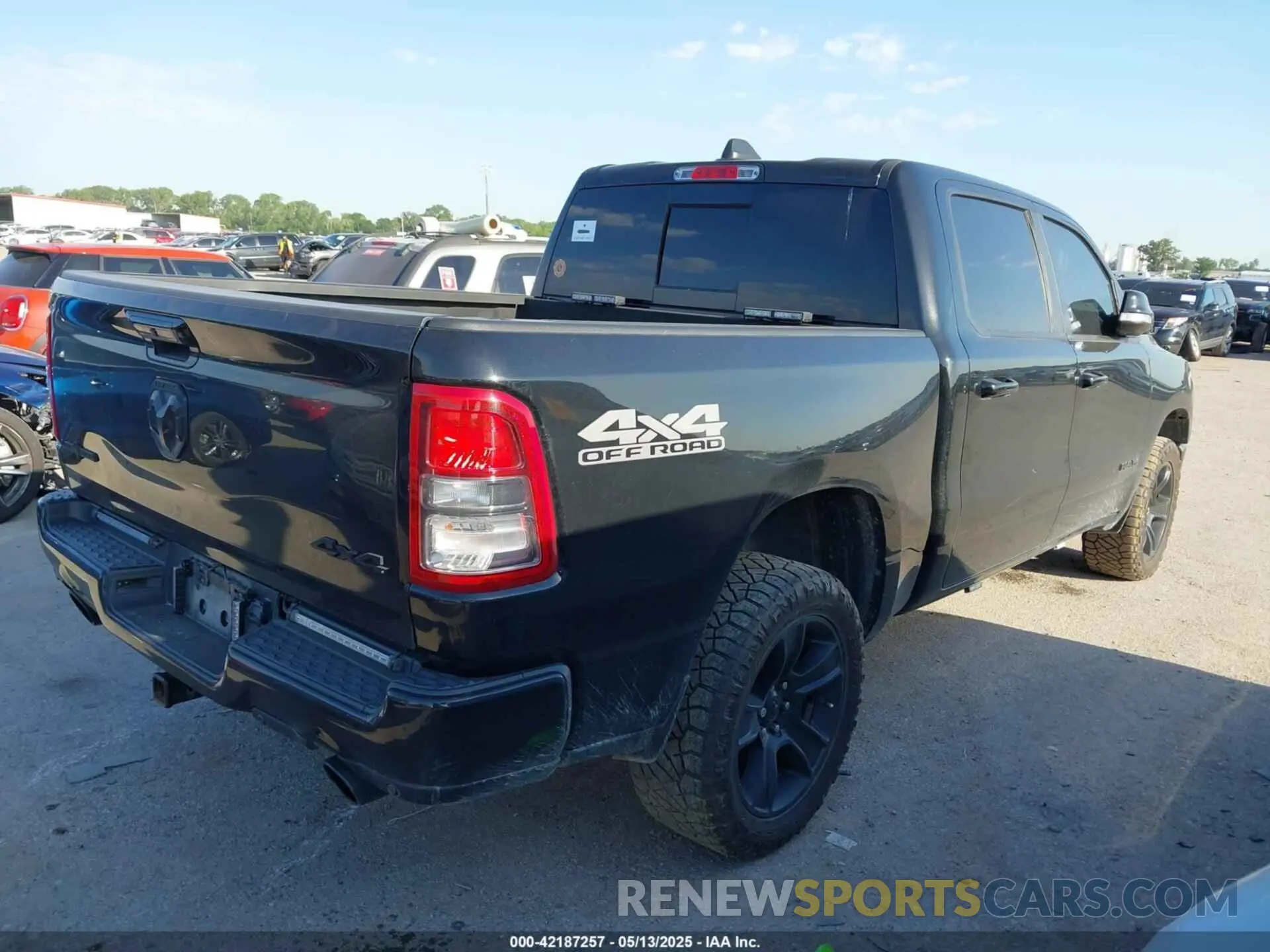 4 Photograph of a damaged car 1C6SRFFT1MN520081 RAM 1500 2021
